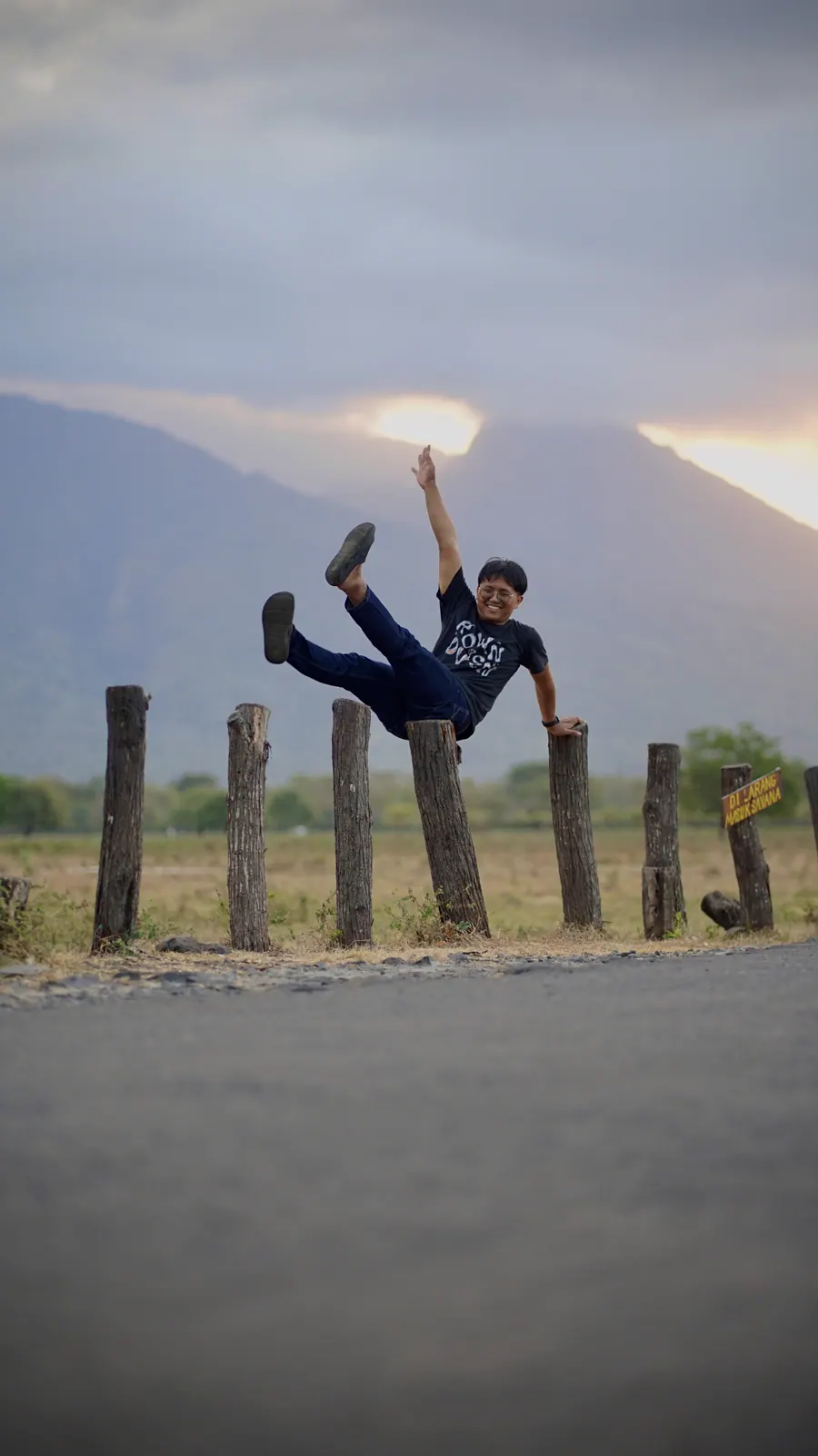 Portrait against the mountains at Baluran